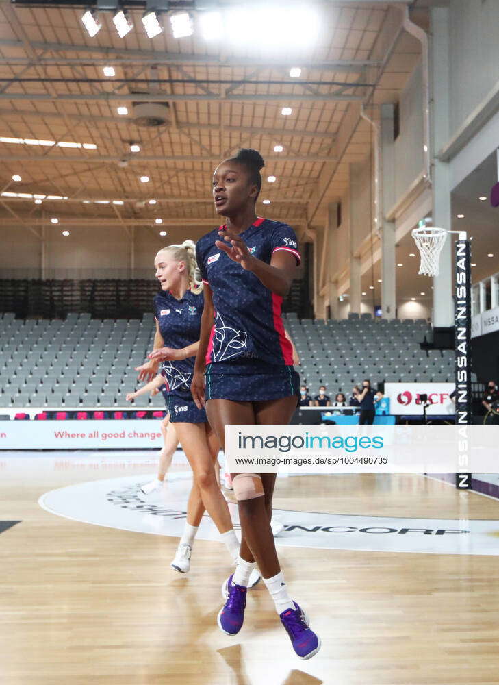 Super Netball Giants Vixens Vixen Players Warm Up During The Round