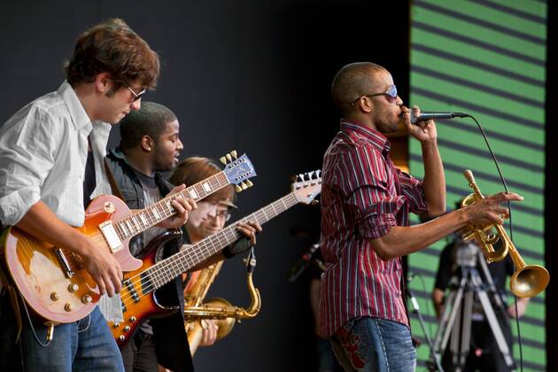 Troy Andrews Know As Trombone Shorty Performs With His Band On The