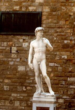 A Replica Of Michelangelo S Masterpiece David Which Stands In Front Of