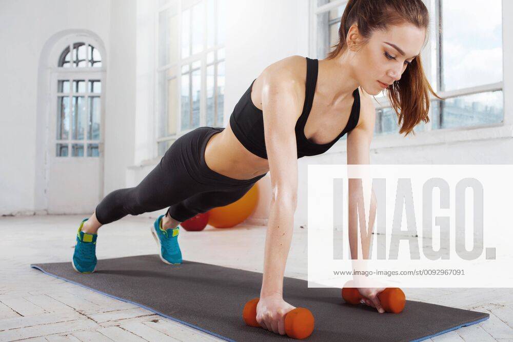 Beautiful Slim Brunette Doing Some Push Ups A The Gym Model Released