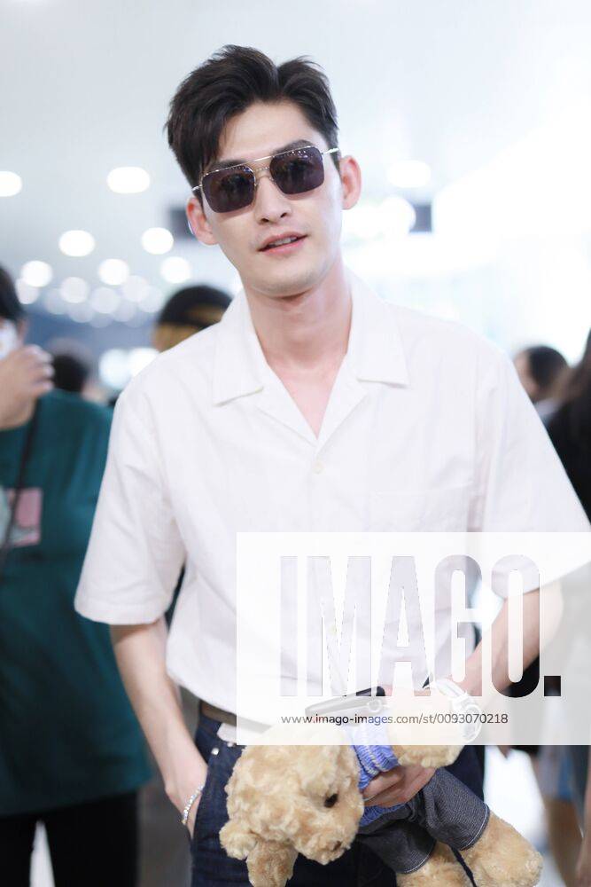 Chinese Actor And Singer Zhang Han Or Hans Zhang Arrives At An Airport