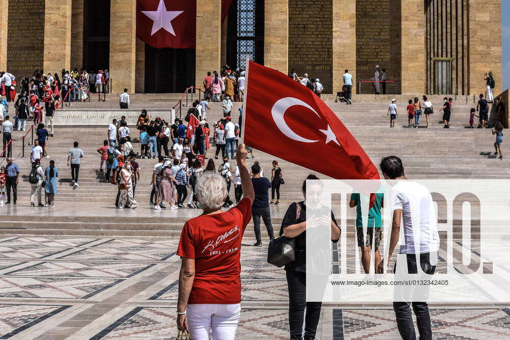 99th Anniversary Of Victory Day A Visitor Waves A Turkish National Flag