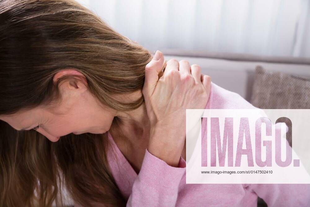 Mature Woman Suffering From Backache Model Released Symbolfoto