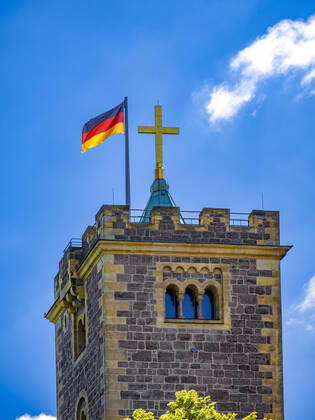 Wartburg In Eisenach South Tower With Cross And Germany Flag The