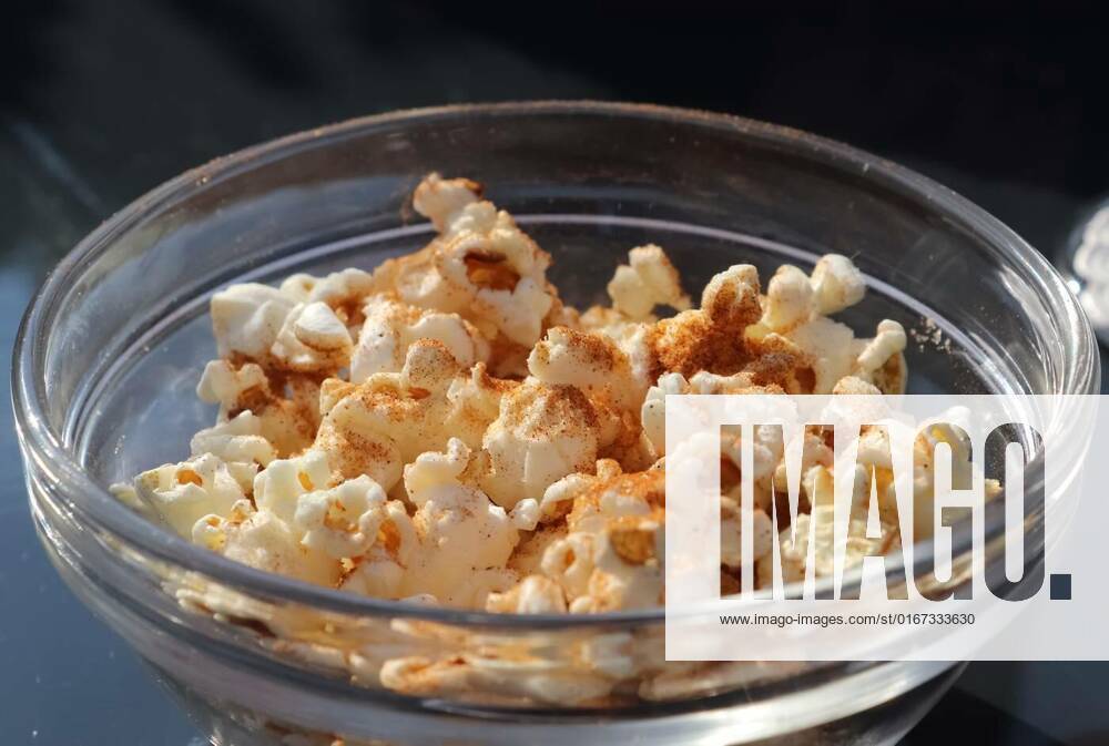 Close Up On Spiced Popcorn In A Glas Bowl Close Up On Spiced Popcorn