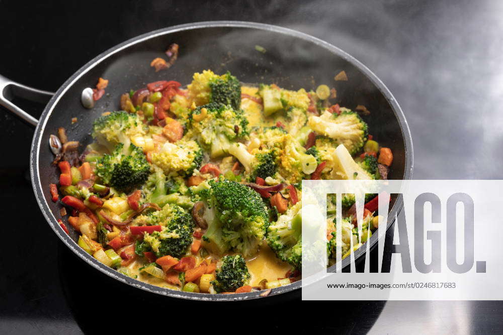 Vegetarian Curry With Broccoli And Other Vegetables In A Steaming