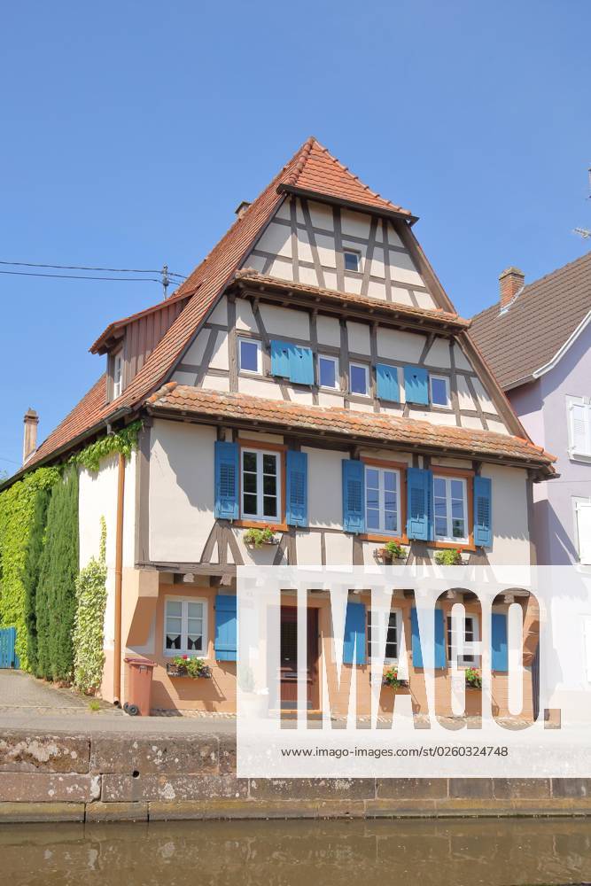 Historical Half Timbered House With Blue Shutters On Faubourg De