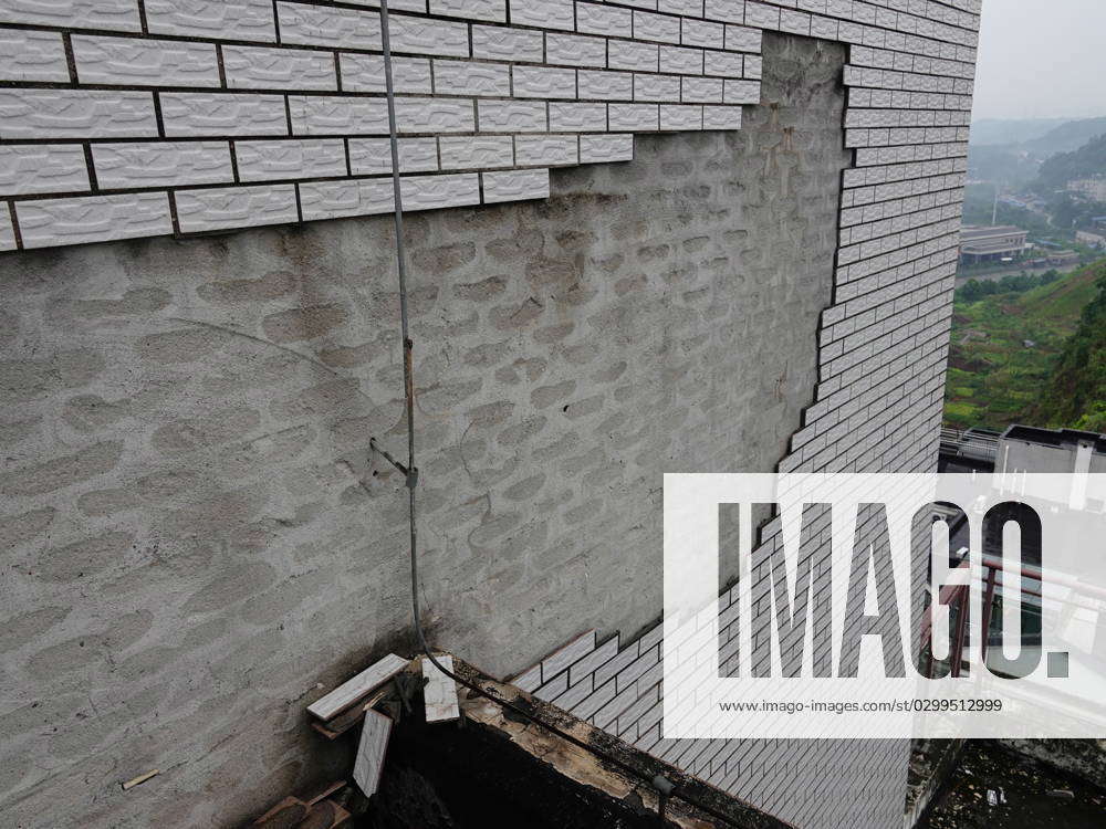 Tiles Fall Off The Exterior Wall Of A High Rise Residential Building In