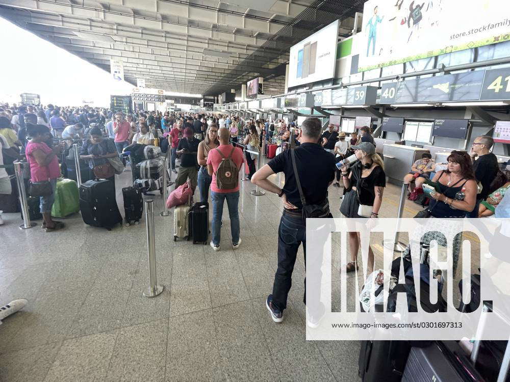 Crowds Form At Catania Airport In Sicily After A Large Number Of