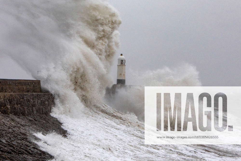 Turbulent Sea At Porthcawl Lighthouse As Waves Are Seen Crashing