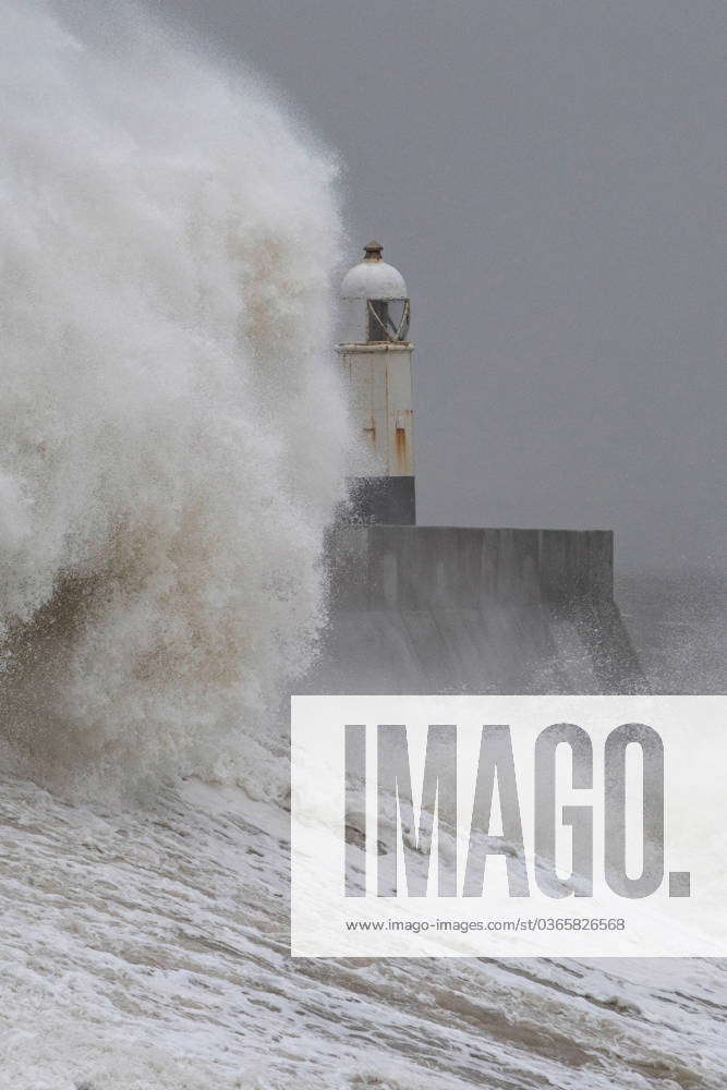 Turbulent Sea At Porthcawl Lighthouse As Waves Are Seen Crashing