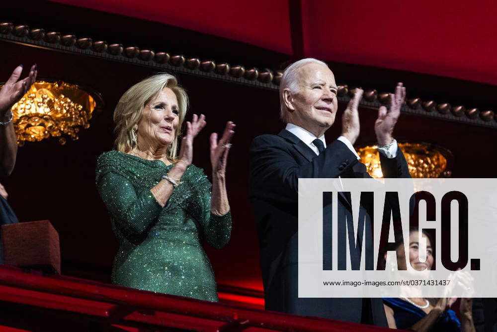 Us President Joe Biden R And First Lady Dr Jill Biden L Attend The