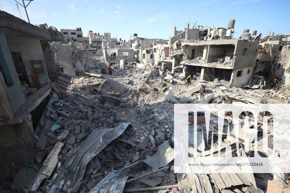 A View Of The Heavily Damaged Collapsed Buildings After Israeli