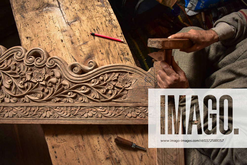 December 7 2023 Srinagar India A Kashmiri Artisan Carves A