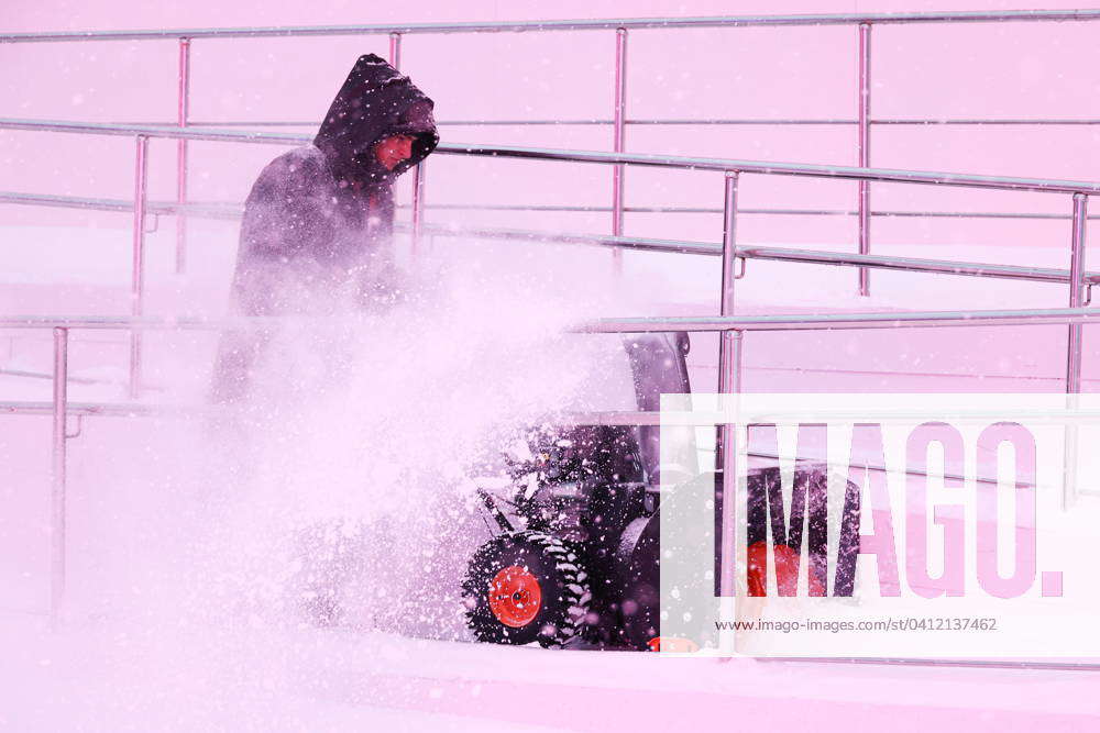 RUSSIA MOSCOW FEBRUARY 7 2024 A Utility Worker Clears Snow In A