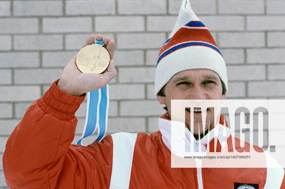 23.02.1980 Alexander Tikhonov, who took part in four Winter Olympics and won four gold medals in the biathlon event, holds gold medal he received during the Thirteenth Winter Olympics in Lake Placid, New York, the United States. 1980. Dmitryi Donskoy Sputnik TIKHONOV BIATHLON CHAMPION