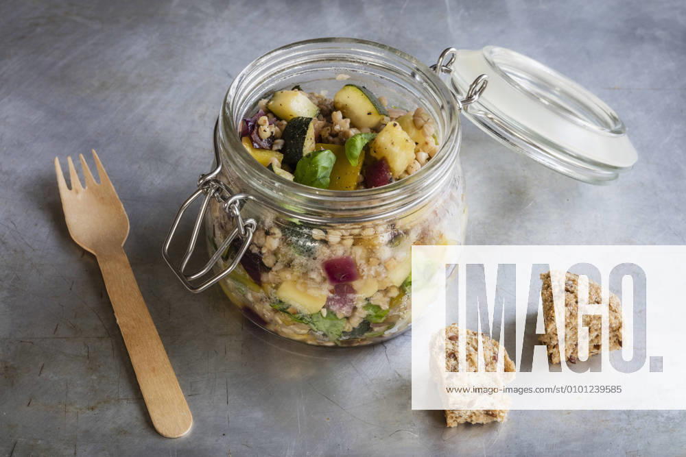 Jar of gluten free vegan salad with buckwheat, zucchini and paprika EVGF03608