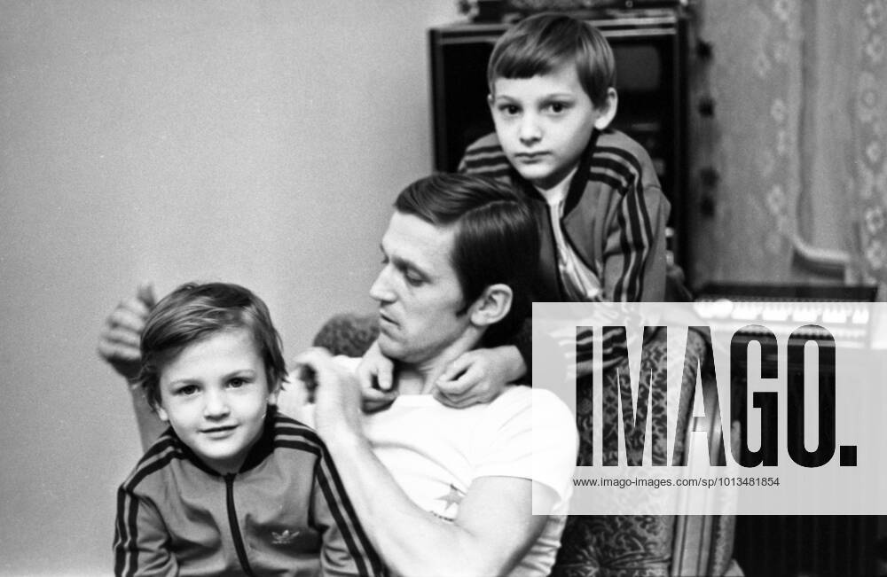 Biathlete Alexander Tikhonov 8242369 25.02.1980 Three-time Olympic champion in biathlon Alexander Tikhonov is seen with his sons at home. Moscow Russia