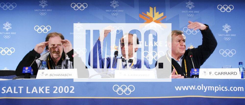 SALT LAKE CITY 020224 OS Doctor P Schamasch, acting head of the IOCs medical committee Arne Ljungqvist and IOC spokesman F Carrard announced today Sunday February 24 that Johan Muehlegg ESP, Larissa Lazutina RUS and Olga Danilova RUS SALT LAKE CITY USA F BILD