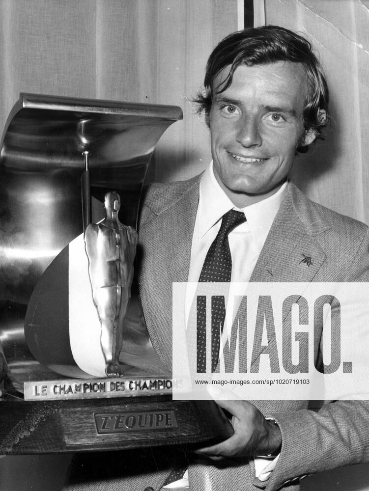 French World Cup alpine ski racer Jean Claude Killy holds up a trophy inscribed with the words Champion des Champions (Champion of Champions) awarded by s newspaper L Equipe. 7 May 1960 France