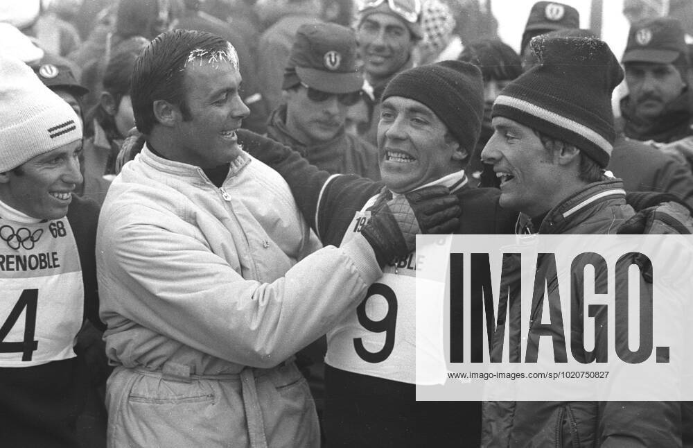 Slalom Winter Olympics Austrian skier Karl Schranz being congratulated by teammate Toni Sailer ( left ) and Frenchman Jean Claude Killy after winning the Olympic slalom event . 18th February 1968 France