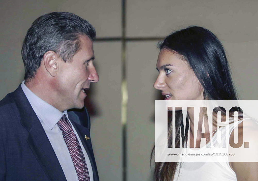 Beijing, Greece. Former Soviet athlete, member of the Committee of Youth Policy, Physical Education, Sports and Tourism of the Verkhovna Rada of Ukraine Sergei Bubka and Russian athlete Yelena Isinbayeva (gold medal in pole vault) have a conversation during the 2006 IAAF World Cup. Robert Maximov TASS 57396198