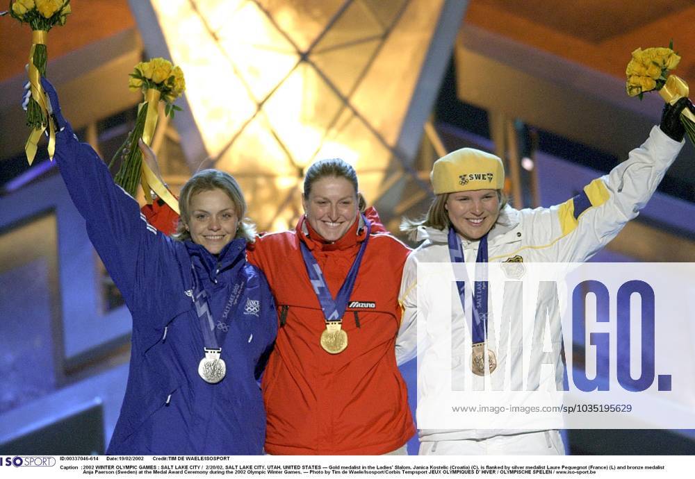 2002 WINTER Olympic Games, Olympische Spiele, Olympia, OS : 2002 WINTER OLYMPIC GAMES : SALT LAKE CITY 2 20 02, SALT LAKE CITY, UTAH, UNITED STATES --- Gold medalist in the Ladies Slalom, Janica Kostelic (Croatia) (C), is flanked by silver medalist Laure Pequegnot (France) (L) and bronze medalist Anja Paerson (Sweden) at the Medal Award Ceremony during the 2002 Olympic Winter games, Winterspiele,Spiele, Summer games --- Photo by Tim de Waele Isosport Corbis Tempsport JEUX OLYMPIQUES D HIVER OLYMPISCHE SPELEN www.iso be Ogden United States ETATS UNIS VERENIGDE STATEN