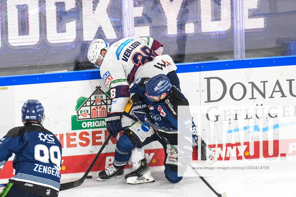 Straubing Tigers vs Grizzlys Wolfsburg, Ice Hockey, German Ice Hockey League, Penny DEL, Matchday 3 Playoffs Quarterfinals, Season 2022 2023, 19 03 2023 Marcel Brandt Straubing Tigers at the boards with Yannick Veilleux Eisbären Eisbaeren Berlin , Ice Hockey Men, German Ice Hockey League, Penny DEL, PlayOffs Semi-Final, Matchday 4, Season 2023 2024 on 07 04 2024 at the Eisstadion am Pulverturm, Straubing Tigers blue against Eisbären Eisbaeren Berlin white