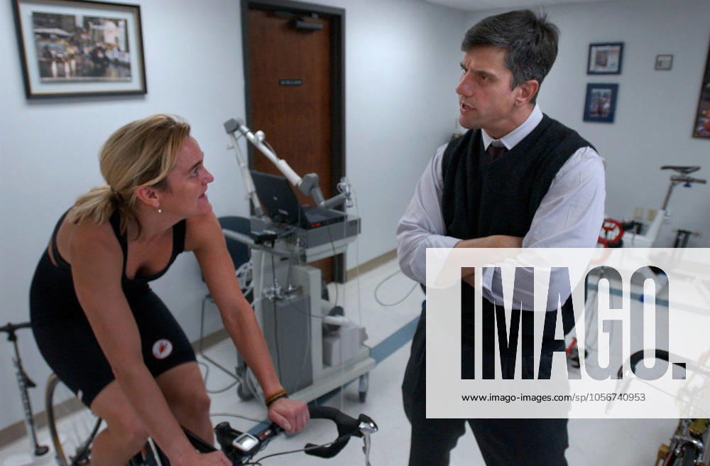 Olympic gold medalist speed skater Eric Heiden, pictured in this 2001 file photo, talks with Julia Violich a professional mountain biker during Physio testing performance testing in Sacramento, California. (Bryan Patrick Sacramento Bee MCT) SACRAMENTO CA USA