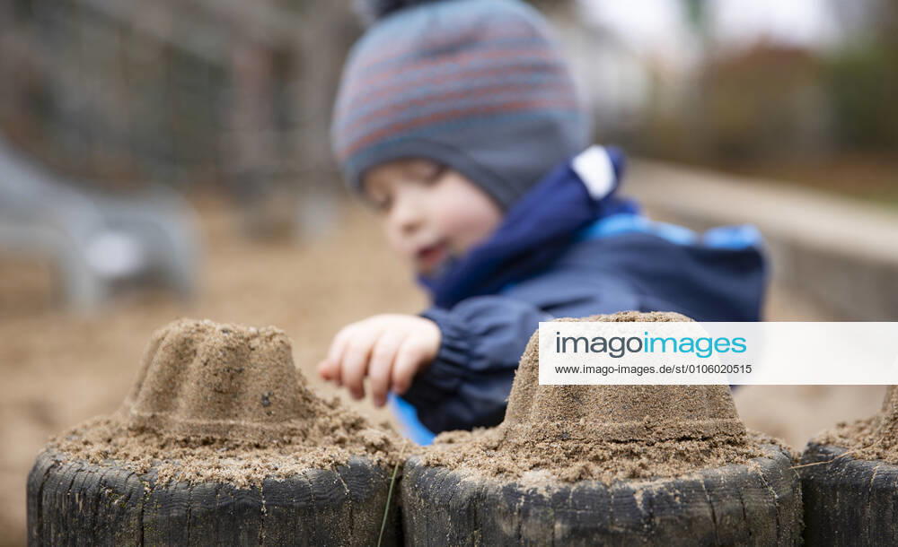 Theme Child sitting alone on a playground