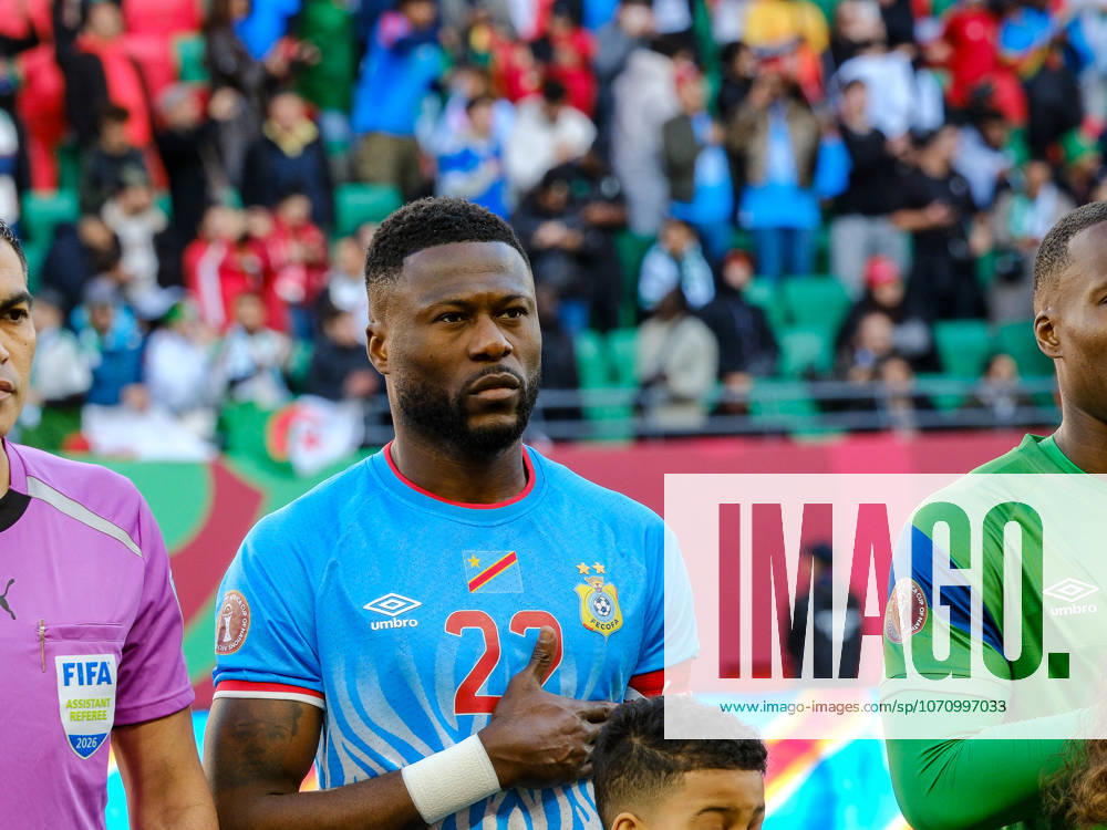 Chancel mbembadisplays patriotism during DR Congo national anthem RABAT, MOROCCO - JANUARY 22: Chancel mbemba of DR Congo stands with his hand over his heart during the national anthem before the AFCON 2025 Round of 16 match against Algeria at Stade Moulay El Hassan on January 06, 2026. The winger s focused expression reflects the importance of the knockout encounter for the Leopards