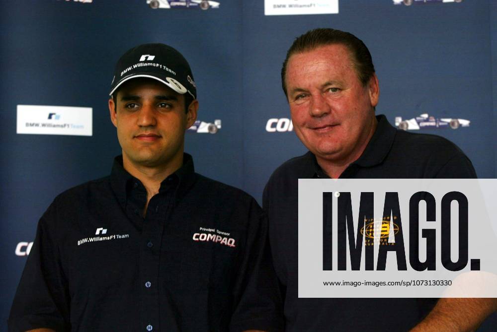 L-R: Juan Pablo Montoya (COL), Alan Jones (AUS) Former Williams World Champion.Compaq Driver Day with Juan Pablo Montoya, Melbourne, Australia