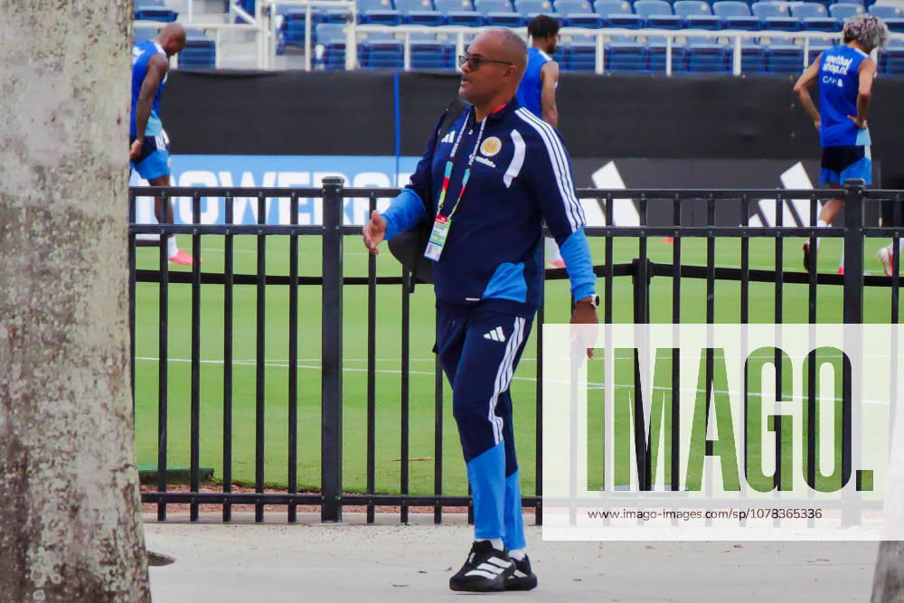 A CuraoÂßao staff member stands near the training field as players take part in a closed practice in Boca Raton, Florida, on Tuesday, ahead of their World Cup debut vs Germany. Boca Raton USA - ZUMAc343 20260609_znp_c343_007