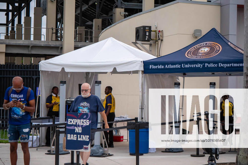 Security personnel work a checkpoint outside FAU Stadium in Boca Raton, Florida, on Tuesday as CuraoÂßao arrived for a closed training session before its World Cup debut vs Germany. Boca Raton USA - ZUMAc343 20260609_znp_c343_016