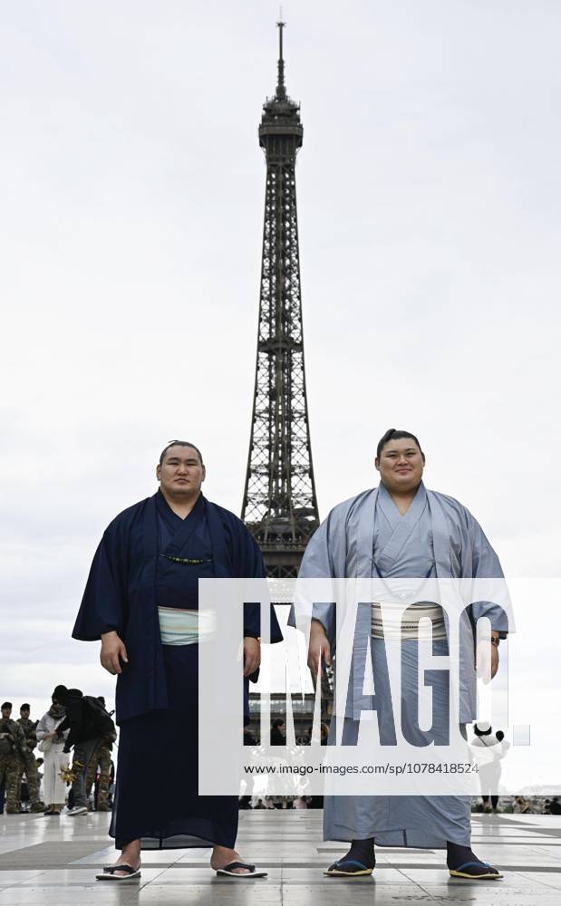 Sumo: Paris tournament Sumo grand champions Onosato (R) and Hoshoryu pose for a photo in front of Paris landmark Eiffel Tower on June 11, 2026, ahead of a June 13-14 sumo tournament in the French capital. A14AA0005618470P