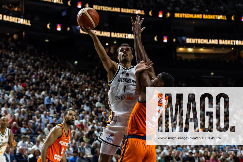 GER, FIBA 2027 Basketball World Cup, European Qualifiers, Cologne, Germany vs. Turkey; Oscar Da Silva (Germany) vs. David N. Guessan (Netherlands); 3, Cologne, LANXESS Arena, North Rhine-Westphalia, Germany