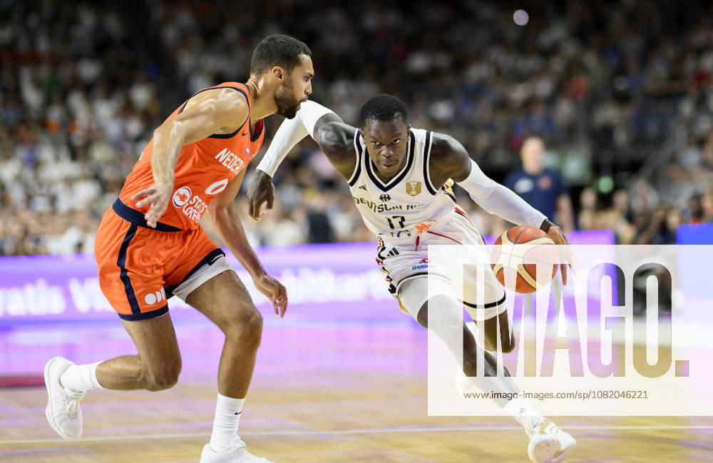 Dennis Schröder of Germany in action against Yannik Franke of the Netherlands; men s basketball FIBA World Cup qualifying game, Second Round Group K, Germany vs. the Netherlands, on August 27, 2026, at the LanxessArena in Cologne, Germany