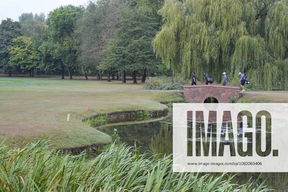 SUTTON COLDFIELD, ENGLAND - AUG 28: Patrick Reed (USA) and Paul Waring (ENG) cross the bridge on the 9th hole during the completion of the delayed Round 1 at the 2026 Husqvarna British Masters at The Belfry, Sutton Coalfield on August 28, 2026 in Warwickshire, England The 2026 Husqvarna British Masters