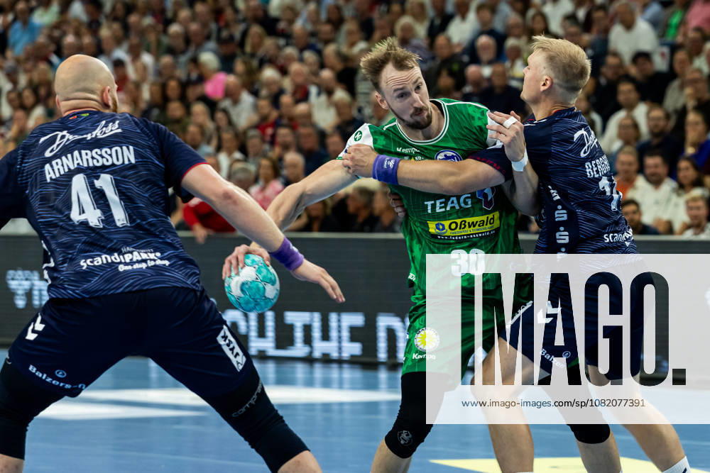 Opel HBL SG Flensburg Handewitt vs. ThSV Eisenach, August 28, 2026: Dominik Solak, No. 30, ThSV Eisenach vs. Arnar Freyr Arnarsson, No. 41, SG Flensburg Handewitt, and Emil Siersbaek Bergholt, No. 14, SG Flensburg Handewitt; Opel HBL SG Flensburg Handewitt vs. ThSV Eisenach, GGW Arena on August 28, 2026