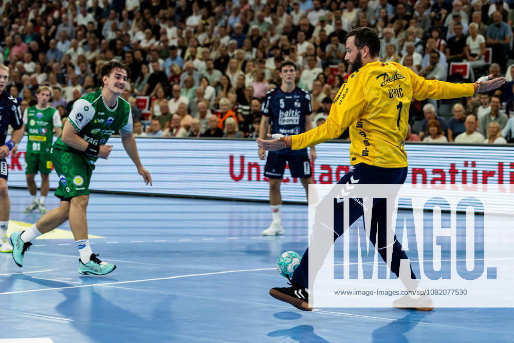 Opel HBL SG Flensburg Handewitt vs. ThSV Eisenach, August 28, 2026: Benjamin Buric (No. 01) of SG Flensburg Handewitt blocks a 7-meter shot by Felix Aellen (No. 22), ThSV Eisenach Opel HBL SG Flensburg Handewitt vs. ThSV Eisenach, GGW Arena on August 28, 2026