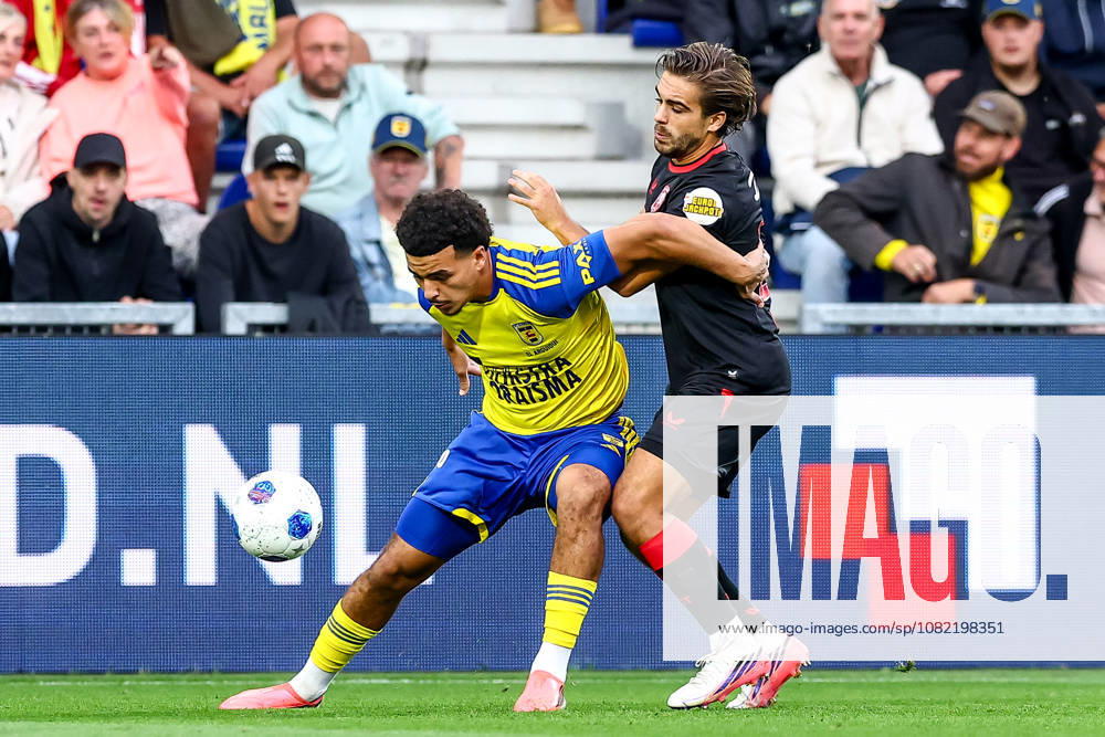 2026-08-30 SC Cambuur v FC Twente - Dutch Eredivisie LEEUWARDEN, NETHERLANDS - AUGUST 30: Rafik El Argiouui of SC Cambuur, Bart van Rooij of FC Twente during the Dutch Eredivisie match between SC Cambuur and FC Twente at Kooi Stadion on August 30, 2026 in Leeuwarden, Netherlands. Leeuwarden Kooi Stadion Netherlands Content not available for redistribution in The Netherlands directly or indirectly through any third parties.