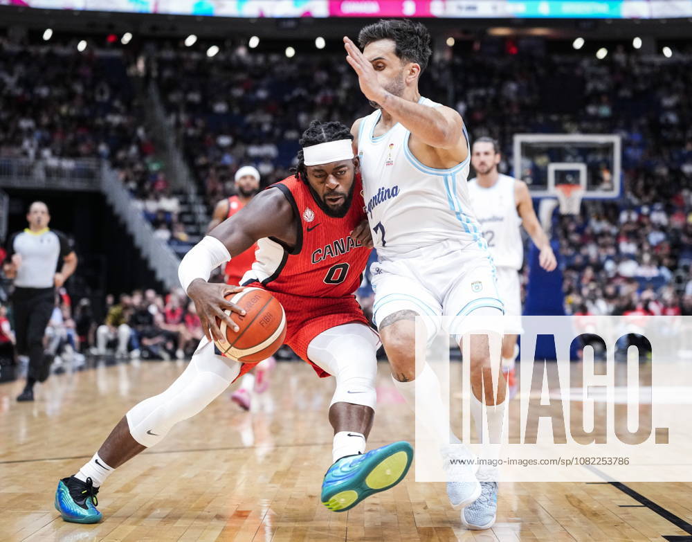 Canada s Luguentz Dort (0) drives the basket against Argentina s Facundo Campazzo (7) during their FIBA world cup qualification action in Quebec City, Monday, Aug.Ã‚ 31, 2026. Luguentz Dort (0) Facundo Campazzo (7) - ZUMAc35_ 20260831_zaf_c35_076