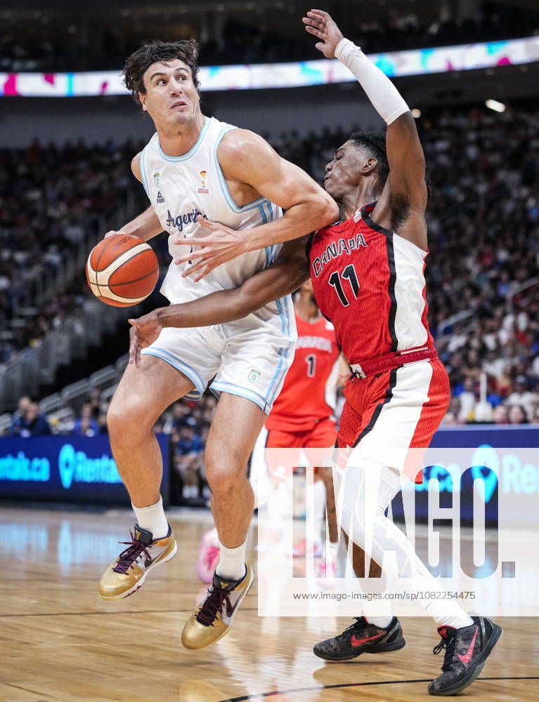 Argentina s Francisco Caffaro (1) drives the basket against Canada s Marcus Carr (11) during their FIBA world cup qualification action in Quebec City, Monday, Aug.Ã‚ 31, 2026. Marcus Carr (11) Francisco Caffaro (1) - ZUMAc35_ 20260831_zaf_c35_087