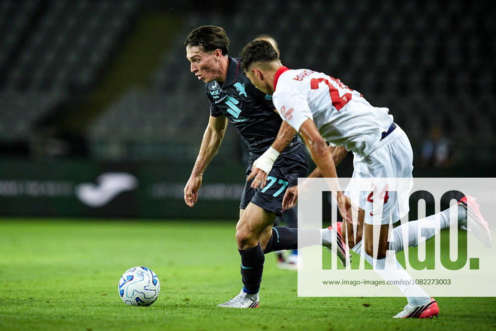MonzaÕs Adam Bakoune fights for the ball with <y77< during Frecciarossa Italian Cup 2026 2027 soccer match between Torino and Monza at the at the Stadio Olimpico Grande Torino in Turin, north west Italy - Tuesday, September 01, 2026. - Soccer .