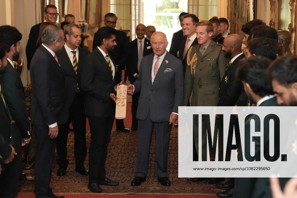 Audience at Clarence House King Charles III is presented with a signed cricket bat as he meets members of the Pakistan National Cricket Team during an audience with the team at Clarence House in London. Picture date: Wednesday September 2, 2026., Credit:Stefan Rousseau PA ROTA - B68 Avalon UK, London