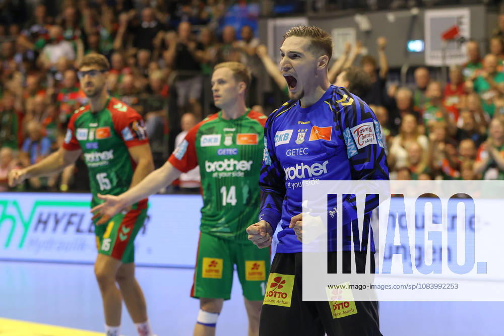 Opel HBL Handball, SC Magdeburg vs. THW Kiel,, from left: Dominik Kuzmanovic (Magdeburg), celebrating a saved shot, blocked, saved, Magdeburg goalkeeper