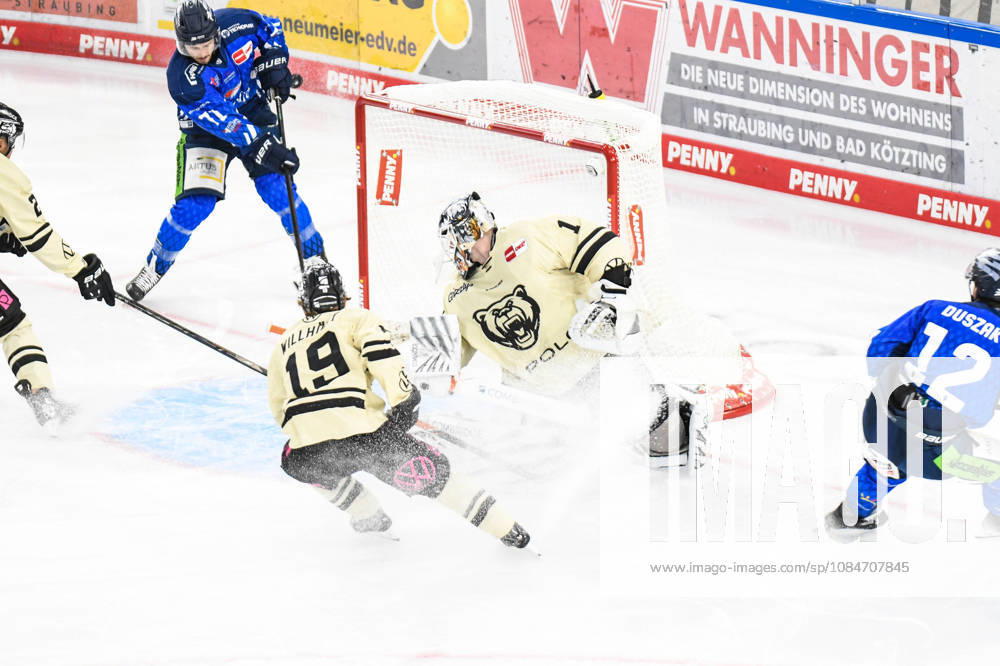 Straubing Tigers vs. Grizzlys Wolfsburg, Ice Hockey, German Ice Hockey League, Penny DEL, Matchday 10, 2026–2027 Season, October 18, 2026: Nicholas Halloran of the Straubing Tigers scores against Dustin Strahlmeier of the Grizzlys Wolfsburg, Men’s Ice Hockey, German Ice Hockey League, Penny DEL, Matchday 10, 2026–2027 Season on October 18, 2026, at the Eisstadion am Pulverturm; Straubing Tigers (blue) vs. Grizzlys Wolfsburg (beige)