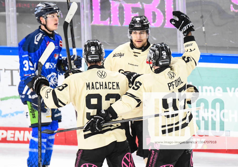 Straubing Tigers vs. Grizzlys Wolfsburg, Ice Hockey, German Ice Hockey League, Penny DEL, Matchday 10, 2026–2027 Season, October 18, 2026: Madison Bowey of the Grizzlys Wolfsburg celebrates his goal with Spencer Machacek and Fabio Pfohl, Men’s Ice Hockey, German Ice Hockey League, Penny DEL, Matchday 10, 2026–2027 season on October 18, 2026, at the Eisstadion am Pulverturm, Straubing Tigers (blue) vs. Grizzlys Wolfsburg (beige)