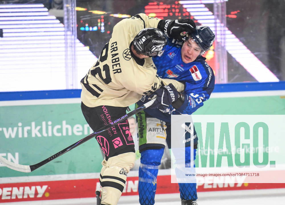 Straubing Tigers vs. Grizzlys Wolfsburg, Ice Hockey, German Ice Hockey League, Penny DEL, Matchday 10, 2026–2027 Season, October 18, 2026: Simon Seidl of the Straubing Tigers in a scuffle with William Graber of the Grizzlys Wolfsburg, Men’s Ice Hockey, German Ice Hockey League, Penny DEL, Matchday 10, 2026–2027 Season on October 18, 2026, at the Eisstadion am Pulverturm, Straubing Tigers (blue) vs. Grizzlys Wolfsburg (beige)