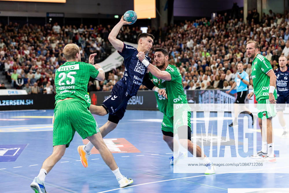 Opel HBL SG Flensburg Handewitt vs. Füchse Berlin 18 10 26 Aymeric Minne No. 44, SG Flensburg Handewitt vs. Matthes Langhoff No. 25, Füchse Berlin, and Mijajlo Marsenic No. 93, Füchse Berlin; Opel HBL SG Flensburg Handewitt vs. Füchse Berlin, GGW Arena on October 18, 2026
